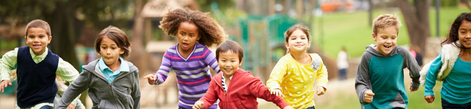 children running outside in park